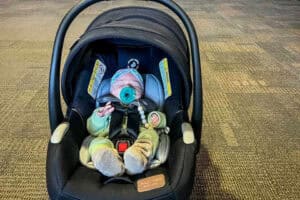 Flying with a car seat baby family