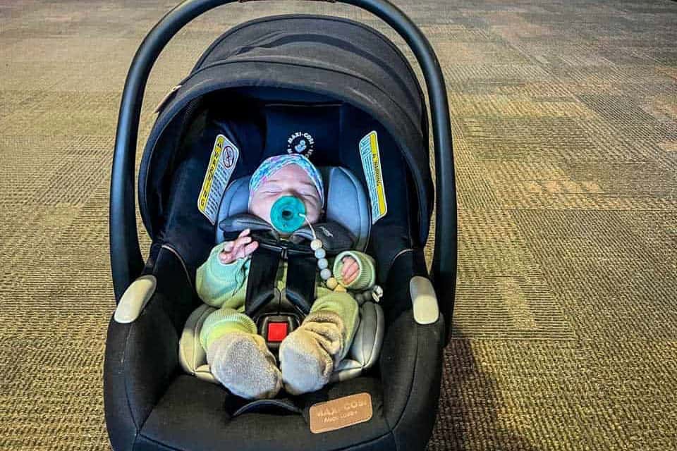 Flying with a car seat baby family