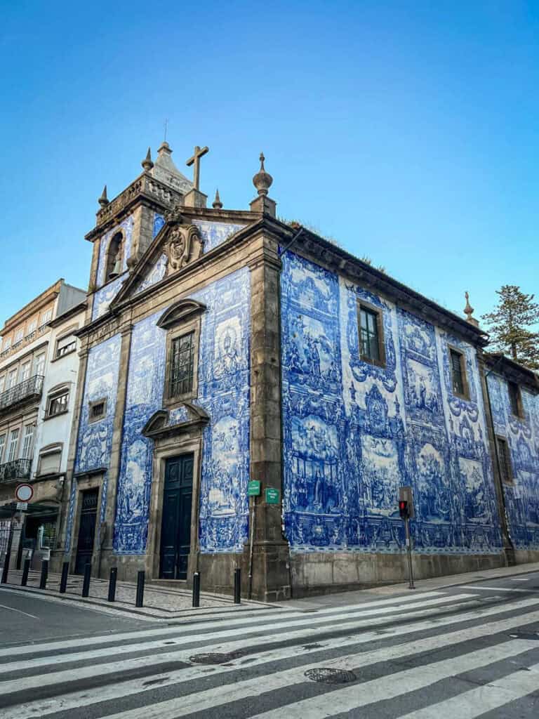 The azuelo tiled exterior of Chapel of Souls in Porto, Portugal