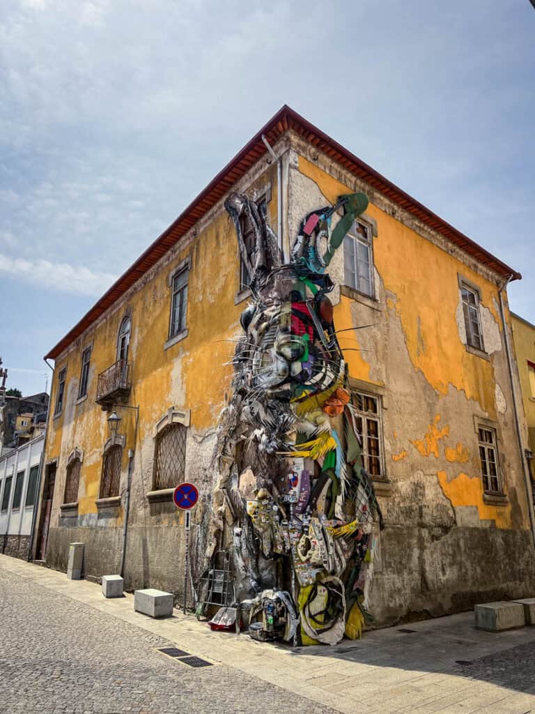 Half Rabbit by Bordalo II street art in Porto, Portugal