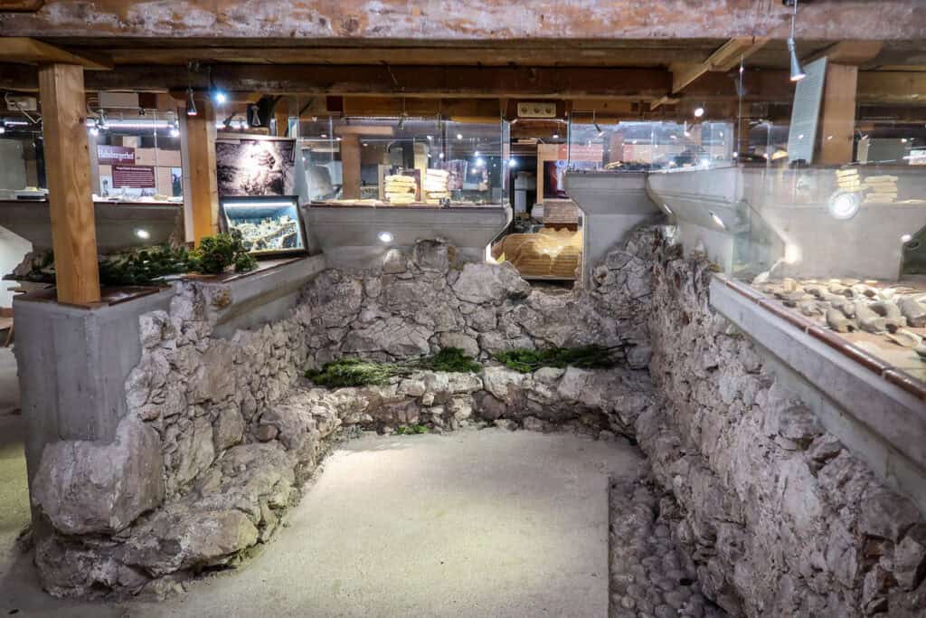 Roman ruins beneath Dachsteinsport Janu souvenir shop in Hallstatt, Austria