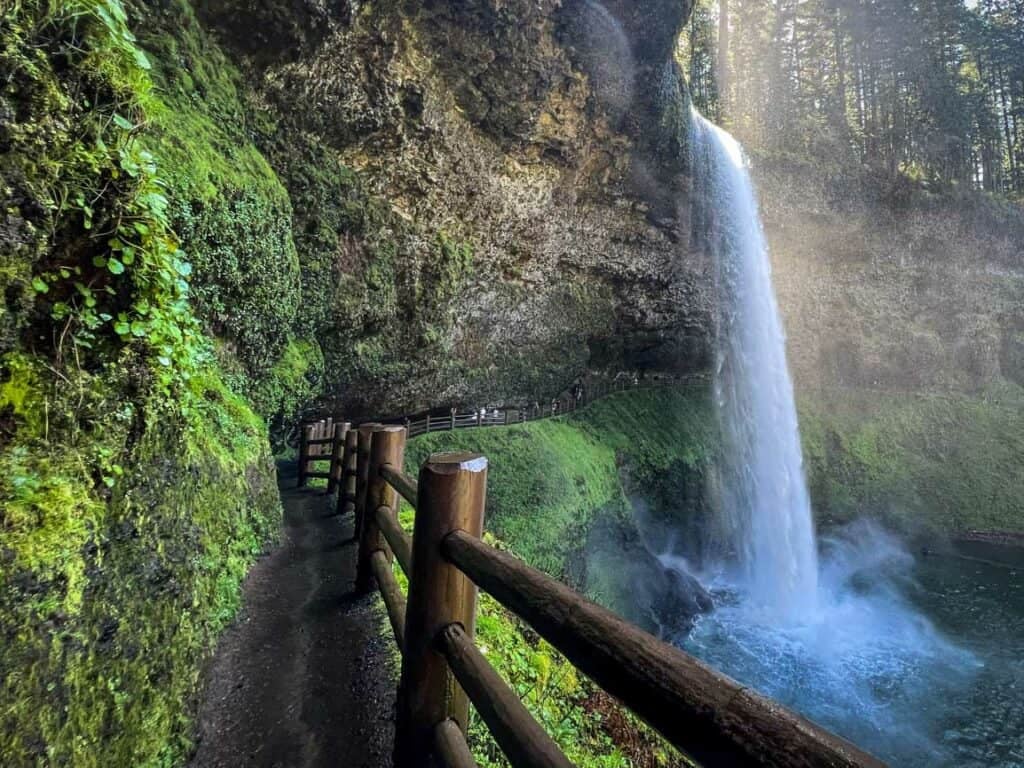 Walk behind South Falls at Silver Falls State Park Oregon